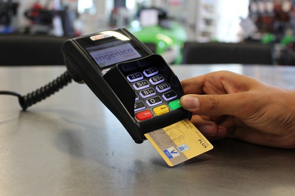 emv credit card being inserted to pay large 1